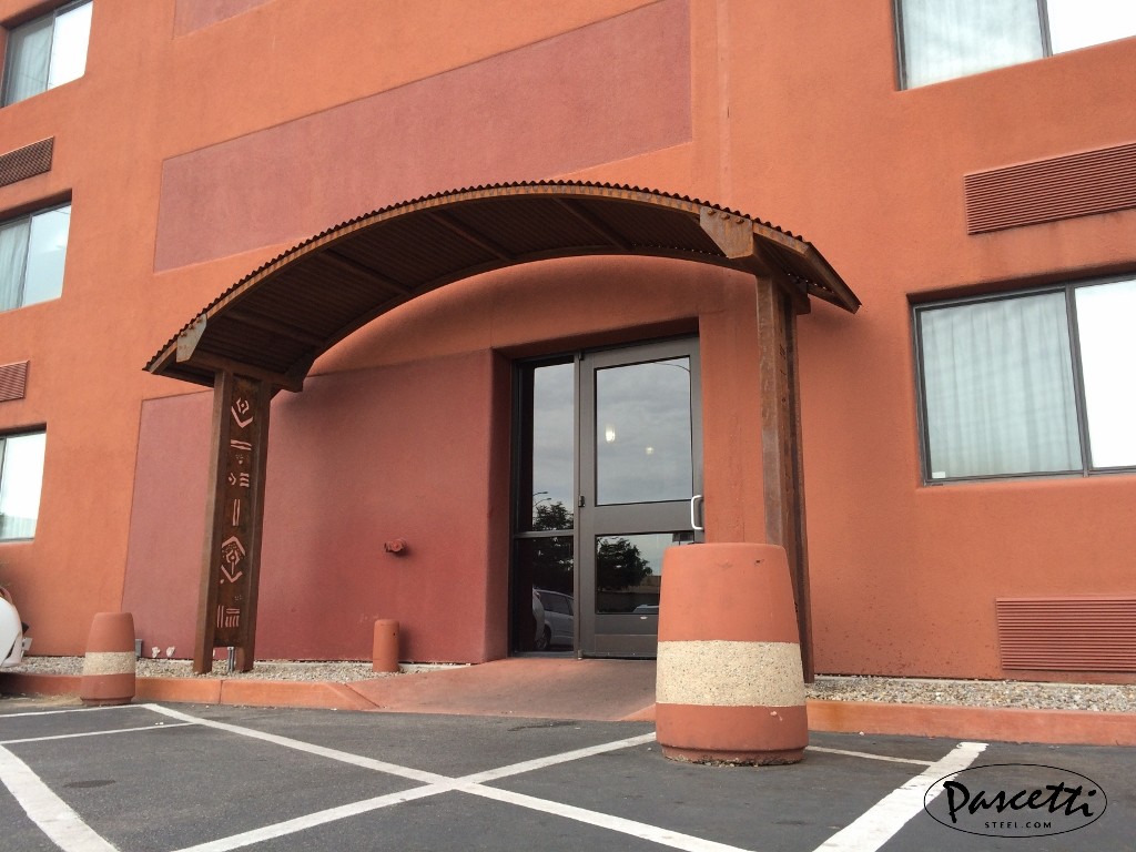 Commercial shade structures with rusted finish and plasma cut outs