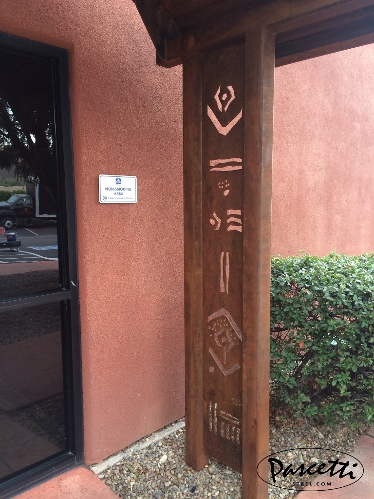 Commercial shade structures with rusted finish and plasma cut outs