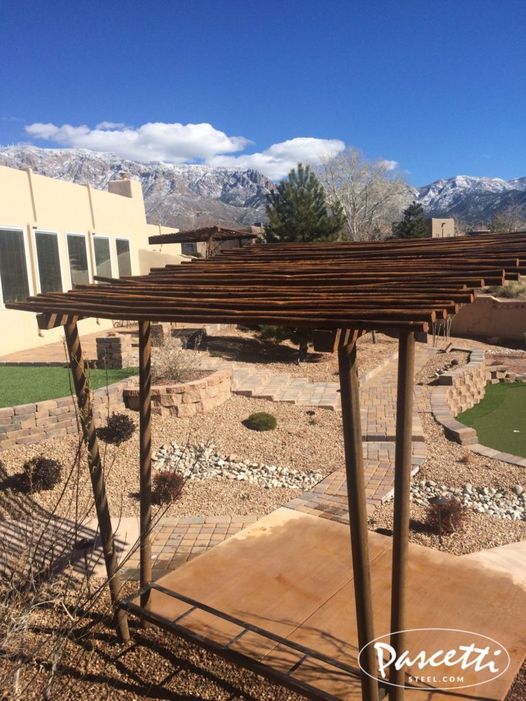 cantilevered shade structure with rust finish