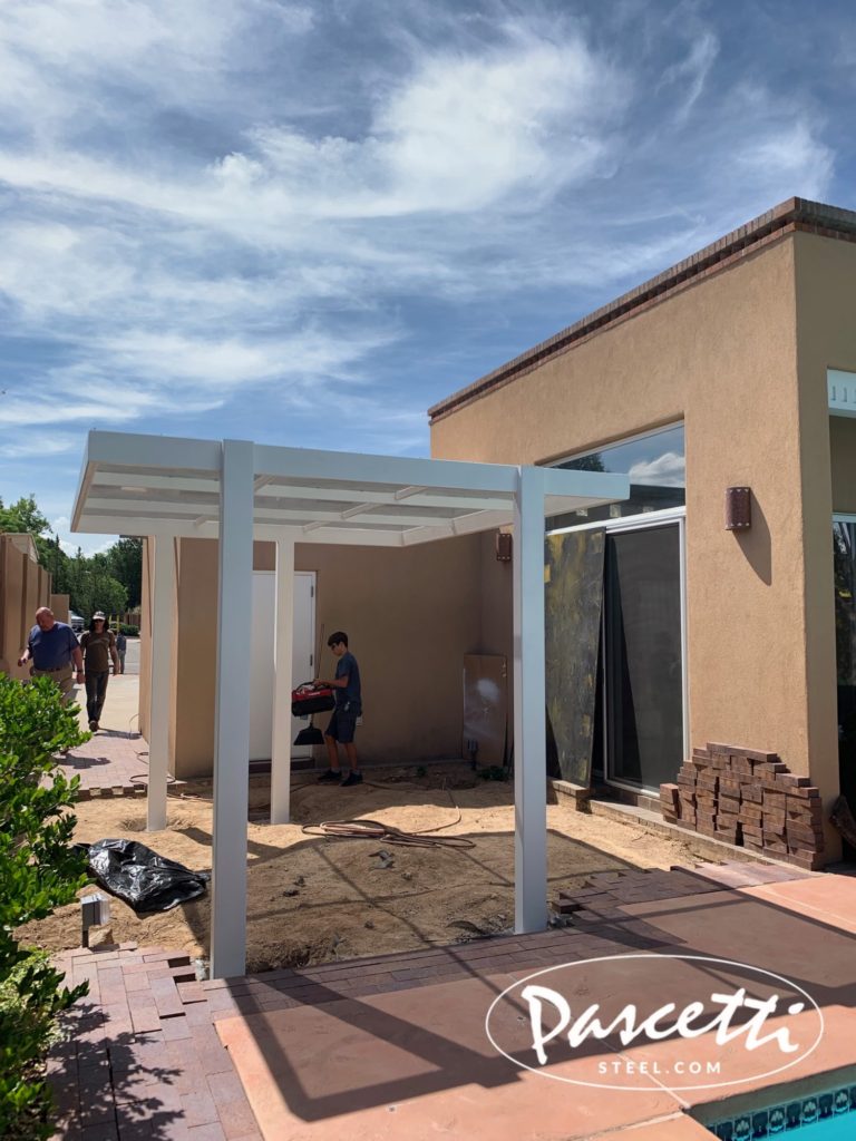 custom steel shade structure with perforated screening